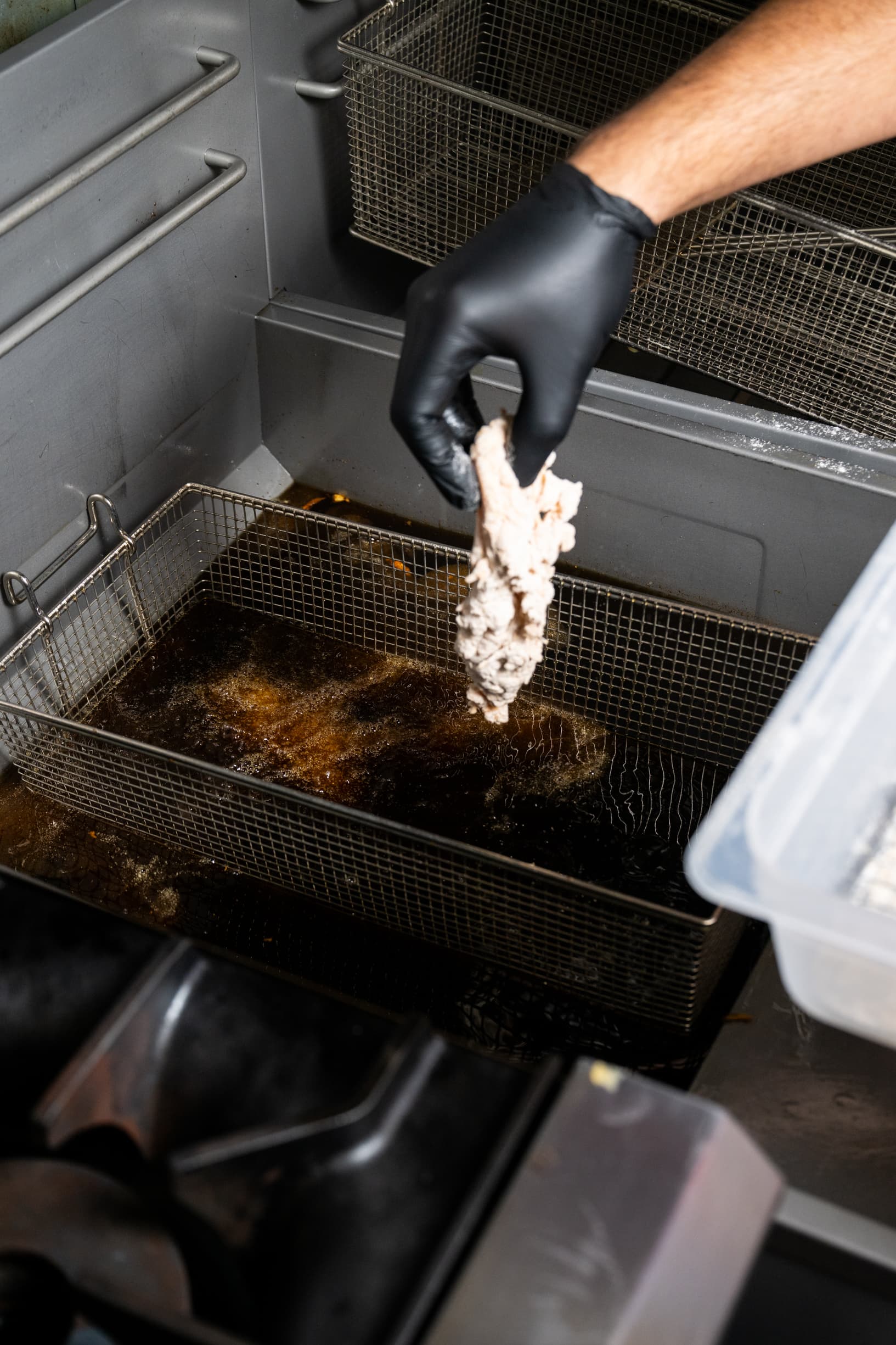 Chicken being fried